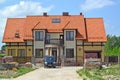 KALININGRAD REGION, RUSSIA. A type on a mansion under construction under a red tile roof Royalty Free Stock Photo