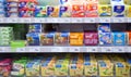 Processed cheese on shelves of supermarket