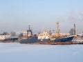 KALININGRAD, RUSSIA. The fishing and search vessel `Strelnya` in the winter in trade seaport. Russian text Strelnya