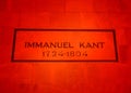 KALININGRAD, RUSSIA. Inscription `Immanuel Kant 1724-1804` on the wall of the burial in red decorative lighting