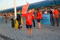 KALININGRAD, RUSSIA. The girl volunteer against the background of the entrance terminal of Baltic Arena stadium. The FIFA World Cu Royalty Free Stock Photo