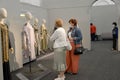 KALININGRAD, RUSSIA. People in medical masks show concert costumes during the epidemic of the coronavirus COVID-19. Art Museum