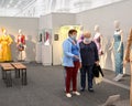 KALININGRAD, RUSSIA. Visitors in medical masks at an exhibition of concert costumes during the coronavirus epidemic COVID-19. Muse
