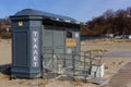 Kaliningrad, Russia - March 31, 2019: Closed toilet at the Baltic sea beach on sunny spring day