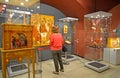 KALININGRAD, RUSSIA. The visitor considers an amber icon at an exhibition in the museum of Amber