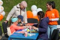 Kaliningrad, Russia - May 25, 2019: Event day `Family medical examination` Kids painting outdoor at the table