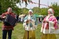KALININGRAD, RUSSIA. The trio of the Russian national folklore ensemble acts during the holiday in the park Royalty Free Stock Photo
