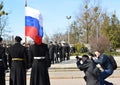 KALININGRAD, RUSSIA. Men photograph I mark group of marines on celebration of the 70 anniversary of storm of Konigsberg