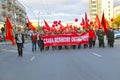 KALININGRAD, RUSSIA. People carry a placard reading `Glory to the Great October!` at the head of a march commemorating the 100th