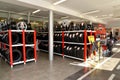 KALININGRAD, RUSSIA. Racks with tires and rims in a trading floor. Shop of an autotechnical center