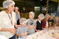 A lesson with a master in the modeling of figures from confectionery mastic. Children`s workshop at the chocolate factory