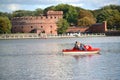 KALININGRAD, RUSSIA. Water walk on a catamaran on the Top lake with a tower of `Der Don` - the museum of Amber ashore