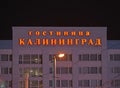 KALININGRAD, RUSSIA. The shining sign name Kaliningrad Hotel on a building facade