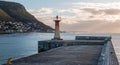 Kalk harbor lighthouse in False Bay at sunset in Capetown South Africa Royalty Free Stock Photo