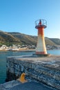 Kalk harbor lighthouse in False Bay in Capetown South Africa Royalty Free Stock Photo