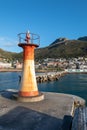 Kalk harbor lighthouse beacon in False Bay in Capetown South Africa Royalty Free Stock Photo