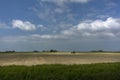 spreading lime over a field.