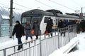 People walk from a suburban electric train in Kaluga