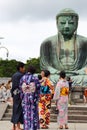 Hundreds of pilgrims, tourists and local people visit everyday the Daibutsu, the famous great bronze buddha statue in kamakura.