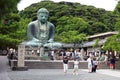 Hundreds of pilgrims, tourists and local people visit everyday the Daibutsu, the famous great bronze buddha statue in kamakura.