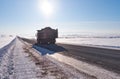 Kamaz truck on winter road and trees under snow in Altai Royalty Free Stock Photo