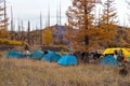 People on the campsite in the center of Kamchatka Peninsula, Russia.