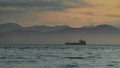 Kamchatka. Sunset on Avacha Bay with a ship on the horizon. Petropavlovsk Kamchatsky.