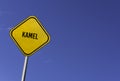 Kamel - yellow sign with blue sky background Royalty Free Stock Photo