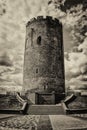 Kamenets tower in black and white style with cloudy sky on background