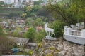 Kamenetz-Podolsky, Ukraine - April 29, 2019: Sculpture of a deer on the slope of the park in Kamenetz-Podolsky. Stone Canyon View