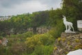 Kamenetz-Podolsky, Ukraine - April 29, 2019: Sculpture of a deer on the slope of the park in Kamenetz-Podolsky. Stone Canyon View