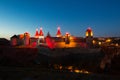 KAMIANETS-PODILSKYI- UKRAINE, AUGUST 31, 2017: Kamianets-Podilskyi medieval castle at night. Night cityscape of the illuminated