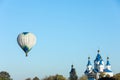 KAMIANETS-PODILSKYI, UKRAINE - OCTOBER 06, 2018: Beautiful view of hot air balloon flying near Saint George`s Cathedral. Space fo Royalty Free Stock Photo