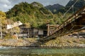 Kamikochi, Nagano, Japan - October 2022 : Unidentified tourists enjoyment at Kappa bashi Bridge at center point area of Kamikochi