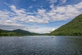 KAMLOOPS, CANADA - JULY 8, 2020: people in the boat Paul Lake Provincial Park with blue sky and white clouds