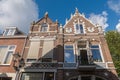 KAMPEN, OVERIJSSEL/ THE NETHERLANDS - JULY 20,2020: Beautiful facades of Dutch historic buildings in the morning light against Royalty Free Stock Photo