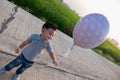 Happy Baby play with balloons