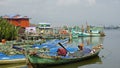 Kampot, Cambodia - circa February 2024: colorful fisher boats in the harbor