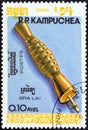 KAMPUCHEA - CIRCA 1984: A stamp printed in Kampuchea shows Sra Lai Rattle, circa 1984.