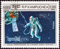 KAMPUCHEA - CIRCA 1986: A stamp printed in Kampuchea shows Cosmonaut Alexey Leonov on space walk, circa 1986.