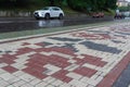 Kamyanets-Podilsky, Ukraine - June 30, 2018: Pavement tiles laid out in the form of Ukrainian pattern