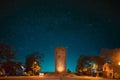 Kamyenyets, Brest Region, Belarus. Amazing Bright Starry Sky Above Tower Of Kamyenyets In Evening Time. Night Dramatic