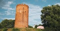 Kamyenyets, Brest Region, Belarus. Tower Of Kamyenyets In Sunny Summer Day With Green Grass In Foreground. Zoom, Zoom In