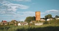 Kamyenyets, Brest Region, Belarus. Tower Of Kamyenyets In Sunny Summer Day With Green Grass In Foreground. Zoom, Zoom