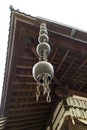 Kanazawa - Japan, June 9, 2017: Bronze rain drain at the the Oyama jinja Shrine as a functional decoration
