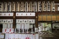 Kanazawa - Japan, June 9, 2017: Interior of the Oyama jinja Shrine with lanterns and bottles of sake as a gift to the shrine