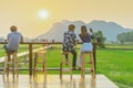 KANCHANABURI THAILAND - April 10 : Unidentified couple sit for resting and waiting for time to take photos of the sunset on April