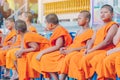 KANCHANABURI-THAILAND, APRIL 17,2019: Unidentified novices sit and wait for the water pouring ceremony on the Songkran festival at