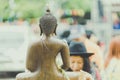 KANCHANABURI THAILAND - APRIL 17 : Unidentified people Shower the monk sculpture in Songkran festival on April 17,2018 at Wat