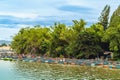 KANCHANABURI-THAILAND,AUGUST 30,2019 : Beautiful scenery view of Nile Red Tilapia fish cages aquaculture floating with floats from